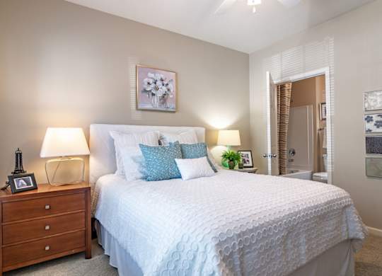 Apartments in Opelika for Rent – The Crossings of Opelika - bedroom with plush carpeting and ceiling fan