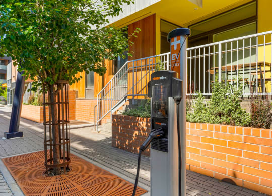 an electric car charger in front of a building