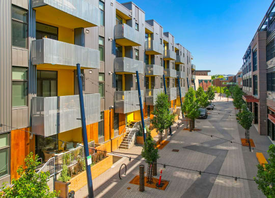 a view of a street in front of a building