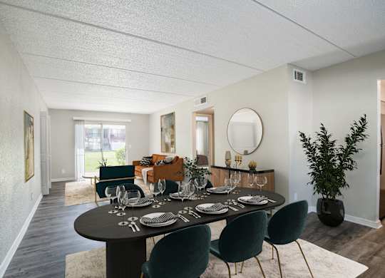 Dining room next to living room with large window and sliding door at Townsend Apartments in Jacksonville near Atlantic Beach, Florida.