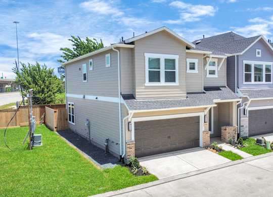 a house with two garage doors
