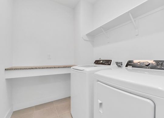 a washer and dryer in a laundry room