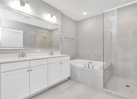 a bathroom with a bathtub and a sink
