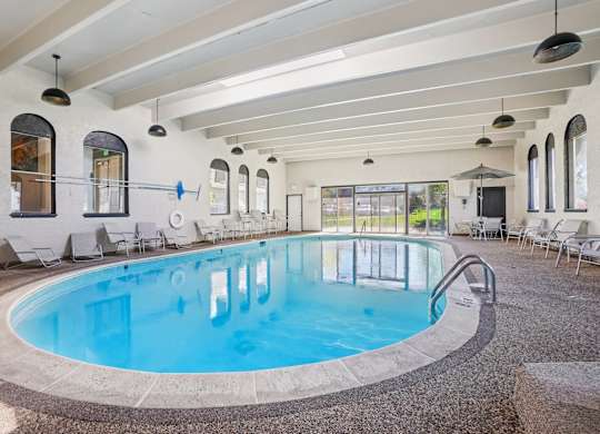 Indoor heated swimming pool at Trailgrove Apartments in Southeast Denver offering year-round recreation for residents.