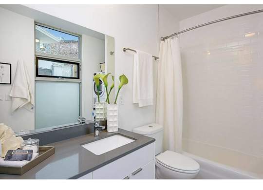 Bathroom with grey countertops