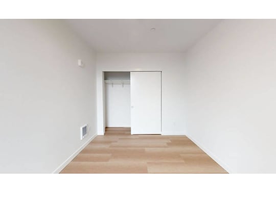 Bedroom with sliding closet door
