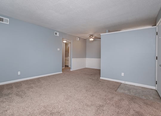 Indian Hills Apartments living room with carpeting