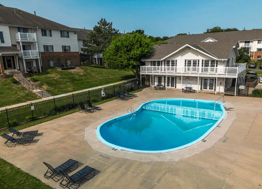 take a dip in the pool at Pacific Winds Apartments