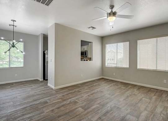 A spacious room with a ceiling fan and wooden flooring. at Habitat @ DTLV, Las Vegas, NV, 89106