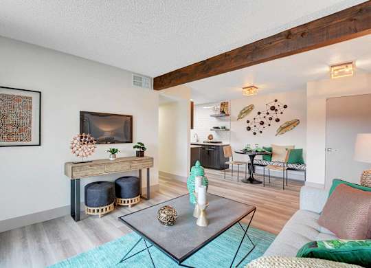 A living room with a fireplace and a couch.