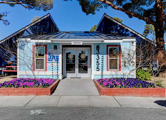A blue building with the word "OPEN" on the front.