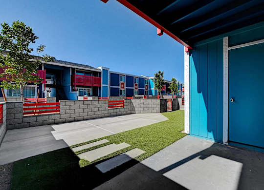A blue door is on the right side of the image.