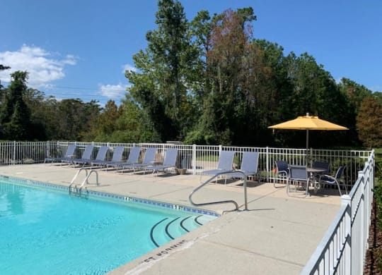 Sparkling swimming pool at Deerbrook Apartments in Wilmington, NC 28405
