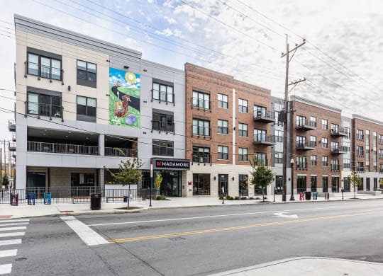 Exterior view of Madamore Apartments featuring the street in front.
