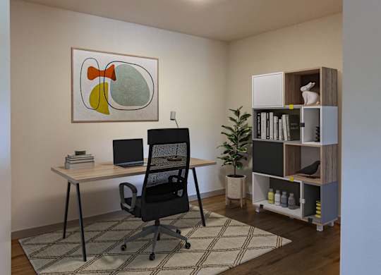 A room with a desk, chair, and a painting on the wall.
