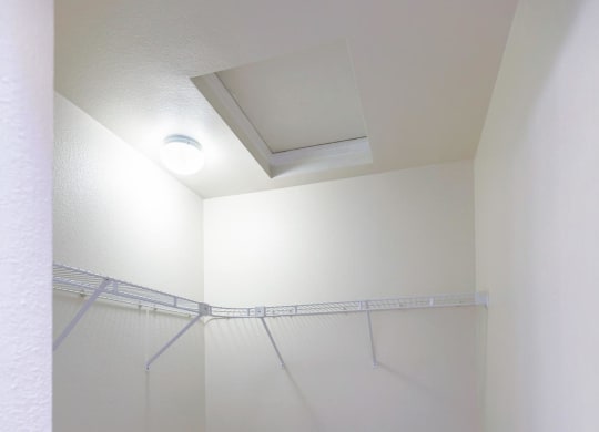 a room with white walls and a carpet