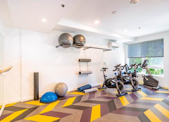 fitness center bike and stretching area