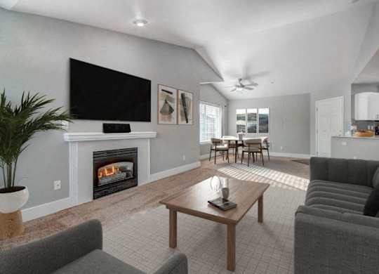 High Ceilings with Fireplace and Comfortable Grey Couch at Clock Tower Village, DuPont, 98327