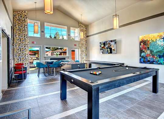 Billiards Table with Foosball Table and High Ceilings at Clock Tower Village, DuPont