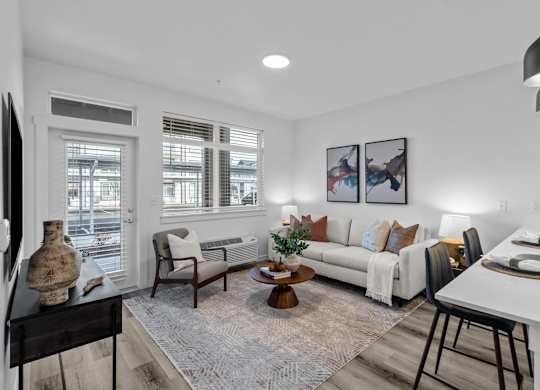 a living room with a couch and a table