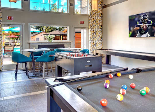 game room with pool table at Clock Tower Village, DuPont Washington