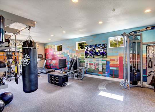 fitness center with cardio and weight equipment at Clock Tower Village, DuPont, 98327