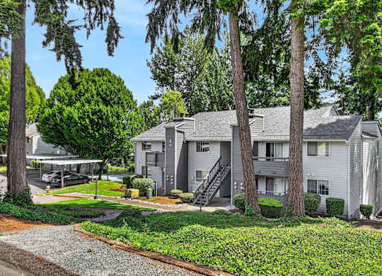 A residential area with houses and trees.