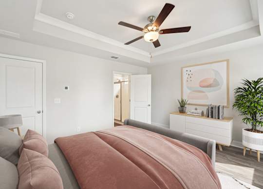 Primary bedroom with attached bathroom
