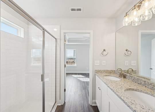 Primary bathroom with walk-in shower.