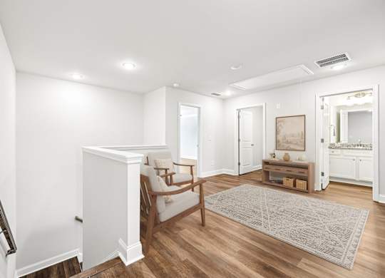 Loft area ideal for family gatherings just steps from the upstairs bedrooms.