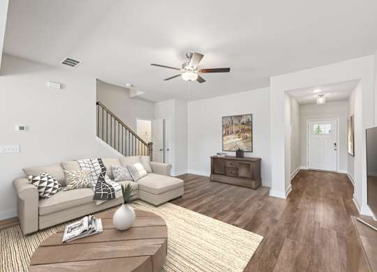 A refined living area offering a graceful view of the home’s entryway.