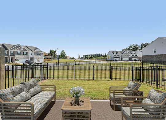 A private fenced patio offering an elegant outdoor retreat.