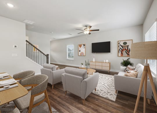 4-bedroom single family home with open-concept floor plans. The kitchen dining room is open to the living room with recessed lighting and ceiling fan.