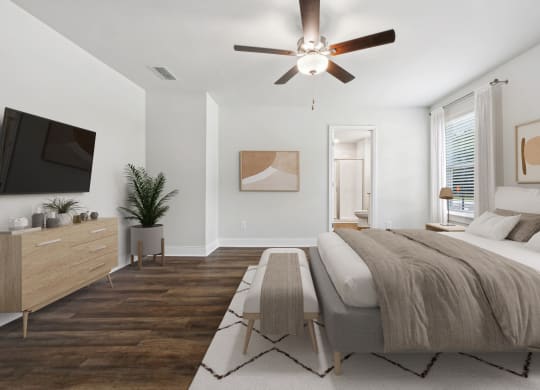 4-bedroom rental with large primary bedroom. Offers room for a king size bed with tons of natural light from the oversized windows. There is a ceiling, attached walk-in closet &