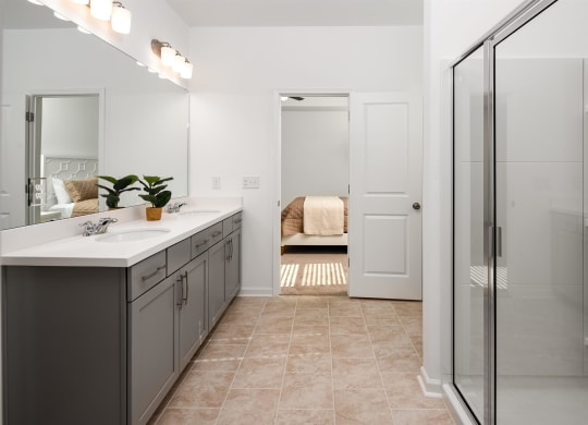 a bathroom with a sink and a shower