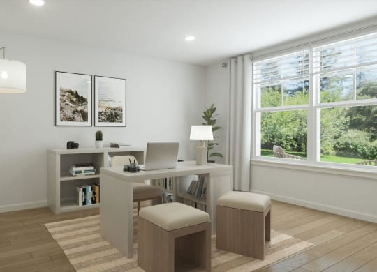 a home office with a desk and a laptop