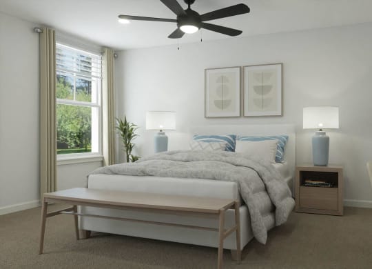 a bedroom with a bed and a ceiling fan