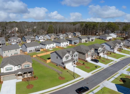 an aerial view of a neighborhood of houses