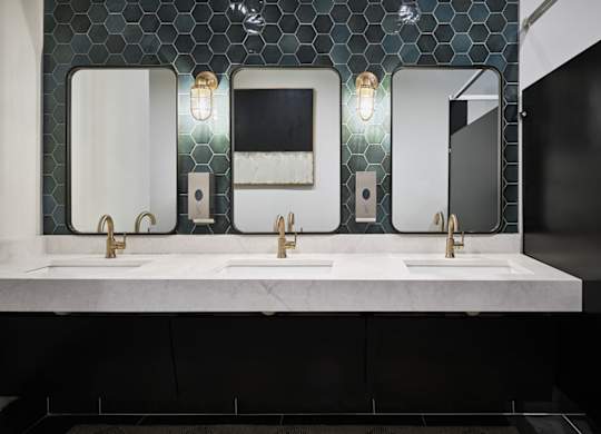 Modern clubhouse bathroom featuring sleek finishes and contemporary design.