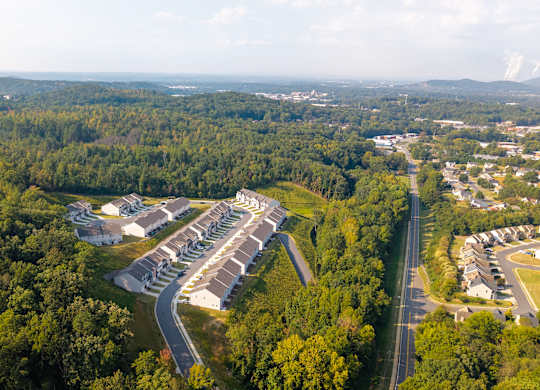 Elevated perspective highlighting the community’s design and surroundings.