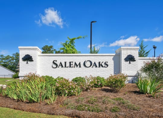 the sign for salem oaks at the entrance to the subdivision
