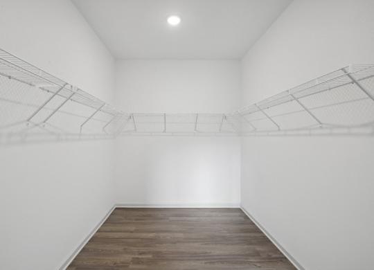 Full size walk in closet.