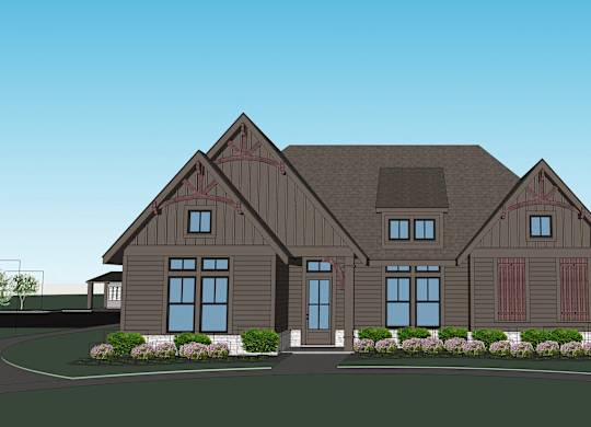 A house with a brown roof and a red garage door.