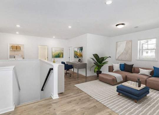 Loft area ideal for family gatherings just steps from the upstairs bedrooms.