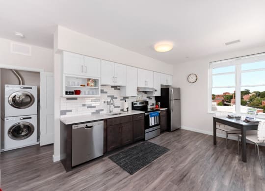 Studio apartment with open kitchen and washer and dryer