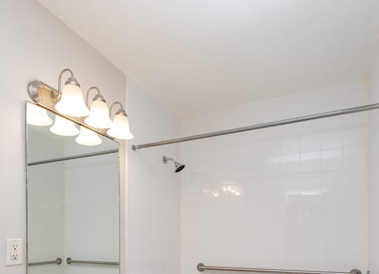 Quincy commons one bedroom bathroom with bright white clean finishes