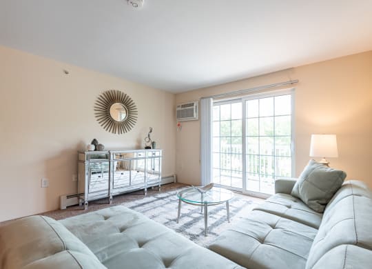 Two bedroom common area living room with balcony