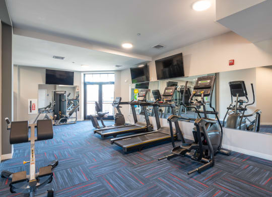 View of the cardio equipment in the fitness room at Millside