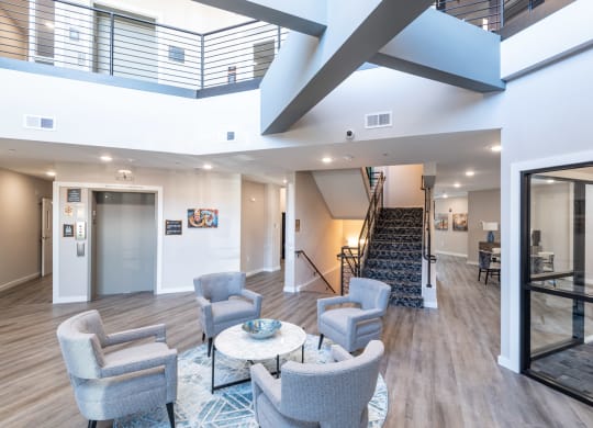 View of the main lobby and stairs at Millside Apartments in Canton