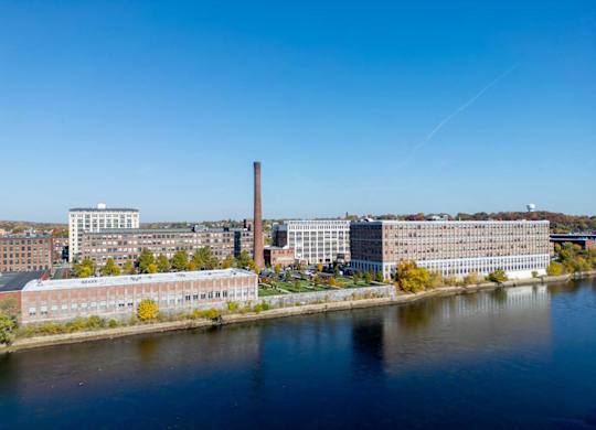 Aerial view of Washington Mill 240 from the river